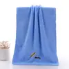 Toalla de vellón de coral suave absorbente toalla de vellón de coral bordada venta al por mayor de fábrica toalla facial bordada lisa toalla facial