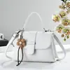 Elegante, simple, versátil, moderna bolsa pequeña cuadrada para mujer, estilo clásico retro de comercio exterior con patrón de lichi, nicho y elegante para ir al trabajo