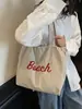 Bolsas para Mulheres Estilo Coreano Nova Bolsa de Ombro de Nylon Estampada com Letras Casual Versátil Leve com Cordão Grande Capacidade Bolsa Tote