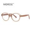 Nuevos lentes anti luz azul 2216 moda TR montura bicolor viento británico montura óptica redonda personalidad fabricantes en stock