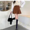 Nueva falda de pana adelgazante de cintura alta para mujer en otoño e invierno 2026, elegante falda de paraguas, falda corta de línea A