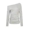 Camisa básica lisa de color sólido estilo coreano UNBDNS para mujer, nueva camiseta de manga larga con mangas abotonadas y un elegante diseño de un solo hombro
