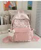 Bolsa escolar de caramelo color crema, suave, esponjosa, de gatito lindo y curativo, mochila versátil para salidas diarias de estudiante niña dulce
