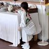 Otoño e invierno nuevo bolso de hombro para niños y niñas bolso de mano de algodón floral pequeño y fresco nuevo bolso cruzado infantil de gran capacidad