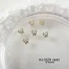 Nuevo Versátil Francés Mariposa Arte de Uñas Accesorios de Pedrería Estilo Coreano Color Sólido Alta Calidad Mariposa Pedrería Material para Uñas Venta al por Mayor