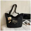 Bolsa de Lona de Mezclilla Casual para Mujer, Bolso de Mano de Gran Capacidad para el Trabajo, Bolso Cruzado de Estilo Nicho Primavera 2026, Mochila de Viaje
