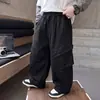 Pantalones cargo plisados para niño de primavera y otoño con bolsillos grandes, pantalones casuales holgados y elegantes estilo coreano para niños