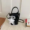 Bolso versátil de primavera y verano para mujer 2026 nueva moda bolso cubo desgastado de moda bolso cruzado texturizado elegante