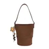 Estilo casual y minimalista, bolso de hombro tipo cubo para mujer, nueva moda 2026, bolso de hombro versátil, bolso cruzado y bolso tote para el trabajo