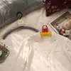 Perchero divertido con forma de Daruma, para uso doméstico, antideslizante, a prueba de viento, percha de plástico, gancho de almacenamiento multifuncional, artículo de decoración para el hogar