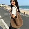 Bolso de Hombro Tejido Hueco de Verano para Mujer 2025 Nuevo Estilo Bolso de Punto con Flor de Hilo Gran Capacidad Bolso Tote