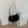 Bolso de mano retro de gamuza de nicho estilo coreano transfronterizo para mujer, nueva colección 2026, adecuado para el uso diario y para ir al trabajo, se puede llevar como bolso de hombro o bolso cruzado