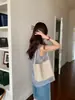 Estilo Novo Outono e Inverno Textura Retrô de Alta Qualidade Bolsa Tote Cesta Casual Moderna Versátil para Ombro/Axila Bolsa Tecida