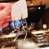 Pendientes Minimalistas de Borla con Líneas Cruzadas 2025 Nuevos de Moda Ins Diseño de Nicho Lujo Accesible Pendientes de Gama Alta
