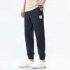 Pantalones Deportivos Fitness Sueltos Versátiles para Hombre 2026 Pantalones Jogger de Moda para Hombre Pantalones Casuales Versátiles Estilo Ins Hong Kong
