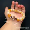 Pulsera Raíz de Bodhi Blanca Estilo Guofeng Loto Rosario de Bodhi Amarillo Leche Quemado al Carbón Puesto de Mercado del Templo Batten Venta al por Mayor