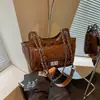 Bolso de hombro único acolchado de rombos estilo pequeño Chanel de lujo ligero, bolsos versátiles, bolso de mano de moda chic con cierre de candado, bolso de axila, comercio exterior, moderno