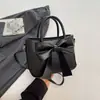 Bolso Transfronterizo para Mujer Moda Suave Simple con Lazo Bolso de Mano 2026 Nuevo Color Sólido Estilo Coreano Bolso de Hombro Cruzado Individual para Mujer