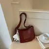Bolso bandolera de diseño de nicho de alta gama con correa ancha para mujer, nuevo bolso de hombro de moda 2026 para commuting