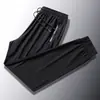 Pantalones Sueltos Casuales de Seda de Hielo de Secado Rápido para Hombre Elásticos Tallas Grandes Pantalones de Seda de Hielo de Comercio Exterior Pantalones de Verano Transpirables Elásticos