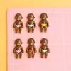 Nuevos Accesorios de Muñeca de Resina Negra DIY Pegamento de Crema Decoración para Funda de Teléfono Colgante de Personaje de Dibujos Animados Venta al por Mayor