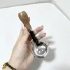 Linda cuchara infantil de acero inoxidable con forma de oso y mango de imitación madera, adecuada para comida de bebé y para comer