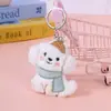Nueva Familia de Perros Cachorros de Dibujos Animados Bufanda Corbata de Moño Accesorios para Muñecas Decoración de Bolsos Accesorios DIY Colgante Venta al por Mayor