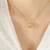 Moda moderna estilo ins coreano regalo versátil para niña Anillo hueco de rama dorada de árbol grande collar con colgante de acero de titanio