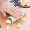 Herramienta de silicona para pelar ajo Pelador de ajo manual para el hogar Pelador de cacahuetes de piel fina Herramienta de cocina Pelador de ajo Prensa de ajo