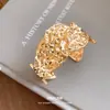 Pulsera abierta de impresión geométrica irregular plisada transfronteriza europea y americana, pulsera simple y elegante, lujo ligero con un toque de alta gama