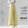 Calça feminina amarela clara de perna curva estilo primavera e outono 2026 nova solta com caimento estilo preguiçoso para baixinhas calça de perna larga