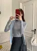 Camiseta interior de punto de cuello alto de lana finamente hilada para mujer, nuevo estilo otoño e invierno, top de suéter interior versátil de cuello alto apilado de 48 hilos