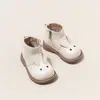 Botas de Cano Alto de Couro de Coelho para Meninas 2025 Nova Coleção Primavera e Outono Botas Estilo Martin para Meninas Botas Individuais para Crianças Pequenas Botas de Couro Confortáveis Versátil