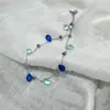 Tornozeleira Azul com Contas em Formato de Gota d'Água, Estilo Coreano, Fresca e Elegante, com Design Irregular e Alto Apelo Estético para uma Vibe de Beira-Mar