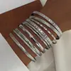 Moda Europea y Americana Nuevo Estilo Moda Personalizada Grabado Trenzado Geométrico Multicapa Apilados Pulseras Set de 10 Piezas Accesorios Al por Mayor