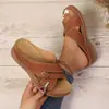 Nuevas sandalias de plataforma gruesa con hebilla de cinturón de color liso estilo europeo y americano, sandalias de playa con tiras cruzadas y tacón de cuña, disponibles en tallas grandes para comercio internacional