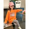 Camiseta de manga comprida para meninas 2026 primavera e outono nova estilosa camiseta básica de primavera infantil para crianças mais velhas, top de algodão puro com desenho