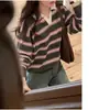 Suéter de punto de manga larga con cuello polo a rayas y bloques de color estilo coreano, nicho ins 2026 principios de otoño, para mujer