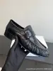 La fila Mocasines de Piel Arrugada Patrón de Anguila 2026 Primavera Tacón Bajo Punta Redonda Piel Genuina Apertura Profunda Zapatos de Una Sola Pieza Mujer