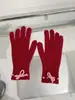 Guantes de punto con lazo de Corea del Sur para estudiantes femeninas Lindo estilo coreano color liso otoño e invierno para montar cálidos con dedos descubiertos pantalla táctil moda