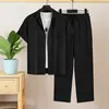 Conjunto Casual de Verano para Hombre 2026 Textura Negra Cuello Cubano Manga Corta Dos Piezas Pantalones Largos Fluidos Venta al por Mayor de Fábrica