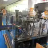 Máquina de envasado al vacío de prueba de alimentación automática de bolsas máquina de envasado al vacío de prueba de alimentación de bolsas máquina de envasado de alimentación de bolsas de polvo de arroz