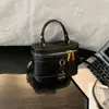 Bolsa caixa texturizada nicho color-blocking bolsa pequena feminina 2026 nova tendência moderna versátil casual bolsa de ombro único transversal