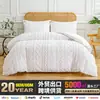 Juego de funda de edredón y fundas de almohada de tres piezas de color sólido bohemio con recortes y borlas, juego de ropa de cama simple para comercio exterior transfronterizo