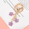 Novo Pingente Chaveiro de Metal Sakura Menina Simples Coração Flor Decoração de Celular Acessórios Pingente de Bolsa Venda por Atacado