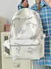 Mochila para Mujer, Versátil Bolsa Escolar para Estudiantes Universitarios, Mochila Casual Mariposa de Gran Capacidad, Diseño de Nicho para Computadora con Letras