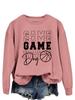 Estación independiente de Amazon juego juego juego día del juego pelota moda europea y americana Joker suéter holgado casual
