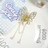 Pasador para mujer 2023 nuevo súper hada borla flor metálica pinza grande cuchara trasera recogido pinza de tiburón tocado