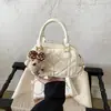 Bolso bordado de nicho súper popular para mujer, nuevo bolso cruzado versátil de moda 2026, bolso de mano exquisito, bolso cojín, bolso cuadrado pequeño