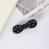Pinza para el cabello de lunares blancos y negros con bloques de color Pinza para el cabello de lazo de estilo cremoso de alta gama Pinza para flequillo lateral Accesorios para el cabello de temperamento a la moda